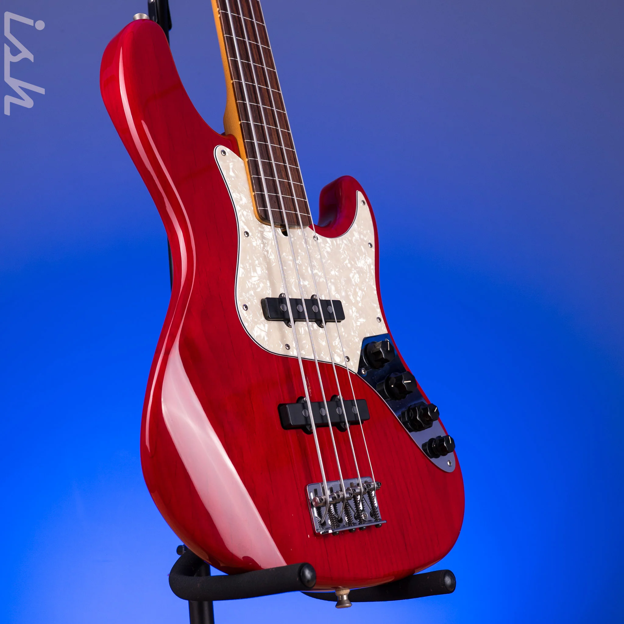 1999 Fender American Deluxe Jazz Bass Fretless 4-String Transparent Crimson Red - Image 3